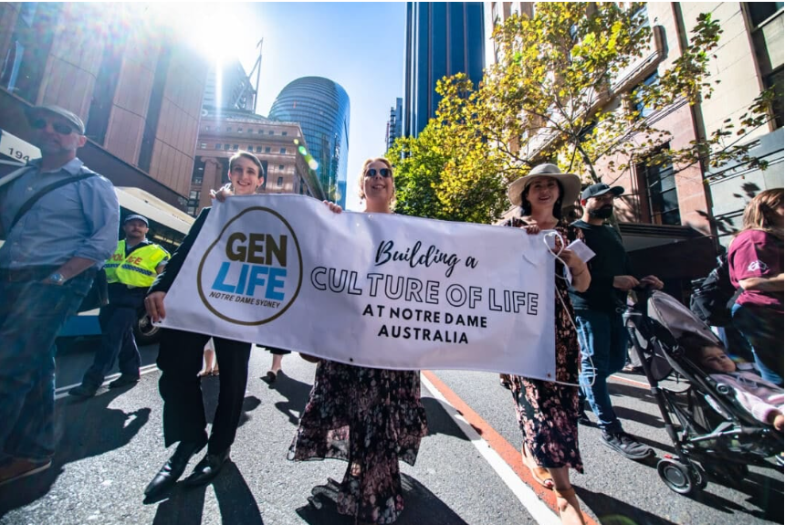 Dr Anna Walsh (right) carries a banner at the 2024 March for the unborn with friends. Images by Giovanni Portelli Photography © 2024 Professional people w